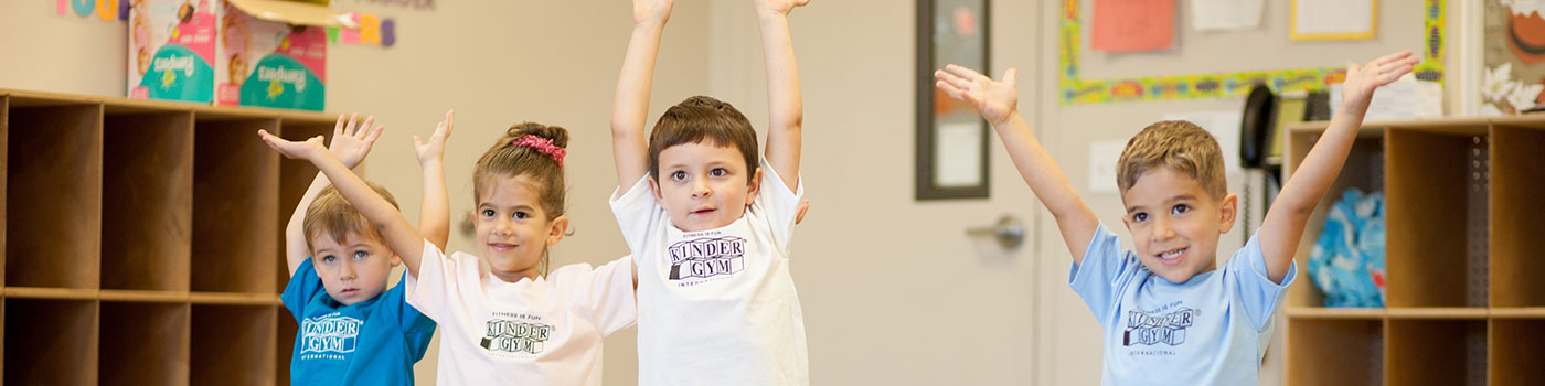 faq-kinderdance-bg kids dancing in classroom